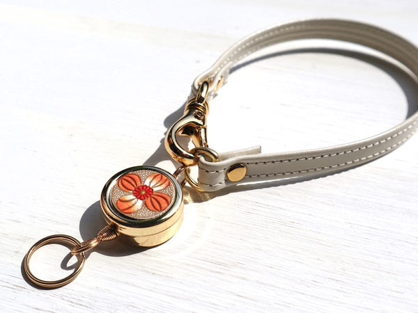 Orange Retractable reel strap